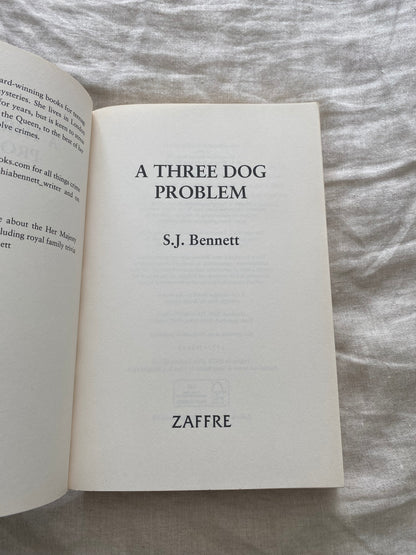 A Three Dog Problem (Her Majesty the Queen Investigates Series #2)
